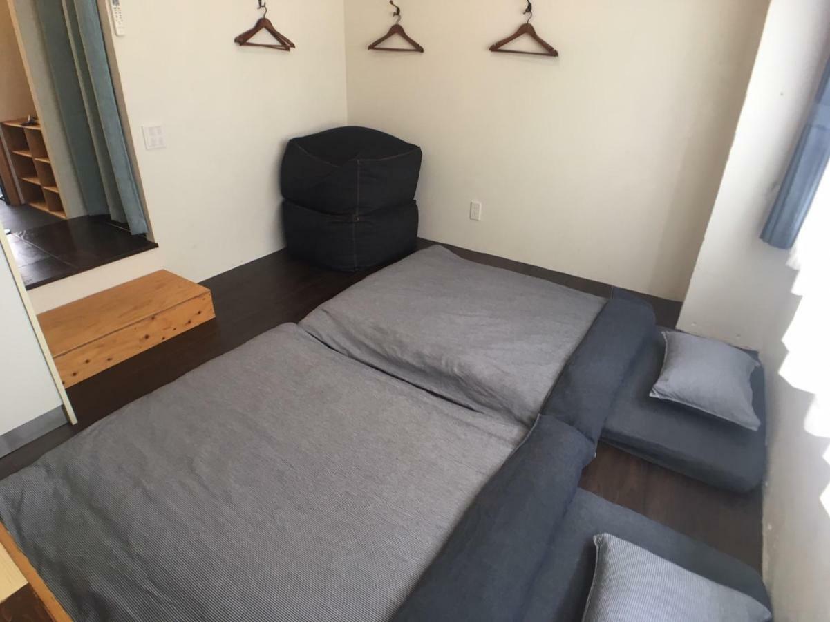 Guest House Golden Mile Hostel Amami Δωμάτιο φωτογραφία